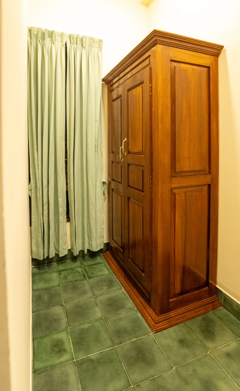 Tall tree canopy of Greenwoods surrounding the Nadhima villa