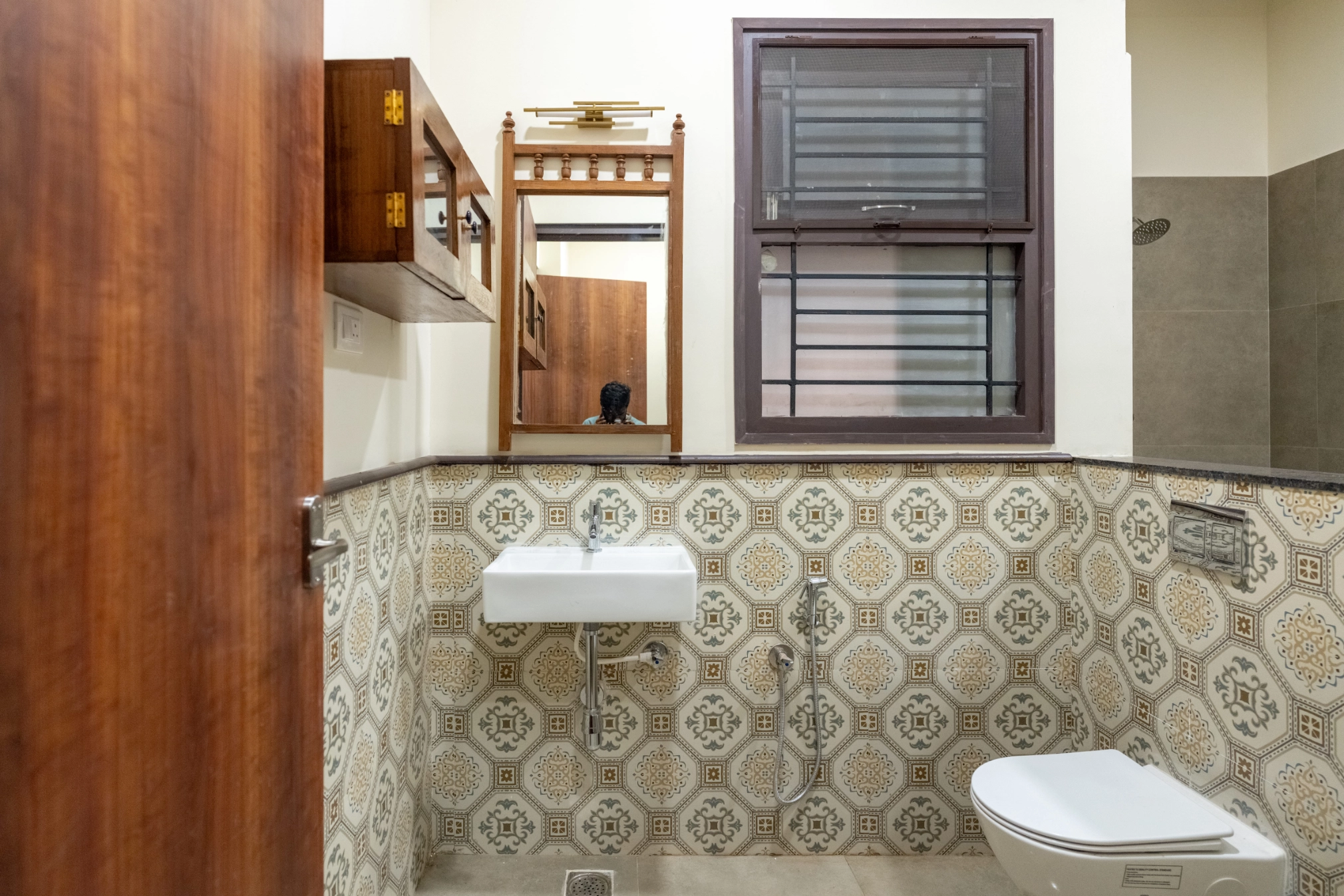 Bhavani Suite interior with views of the villa courtyard